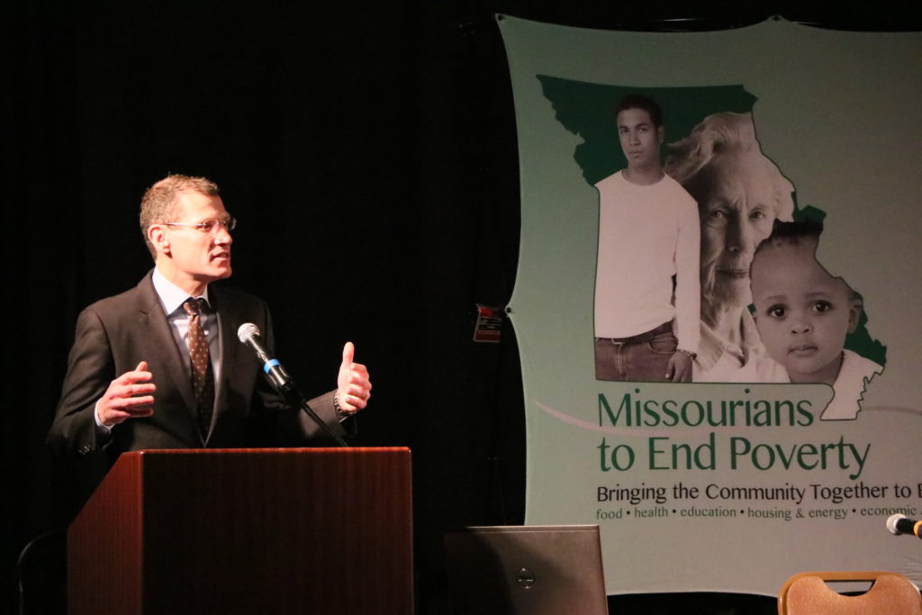 Treasurer Clint Zweifel opens the Summit. He encouraged the attendees to use conversations to spur meaningful action. 