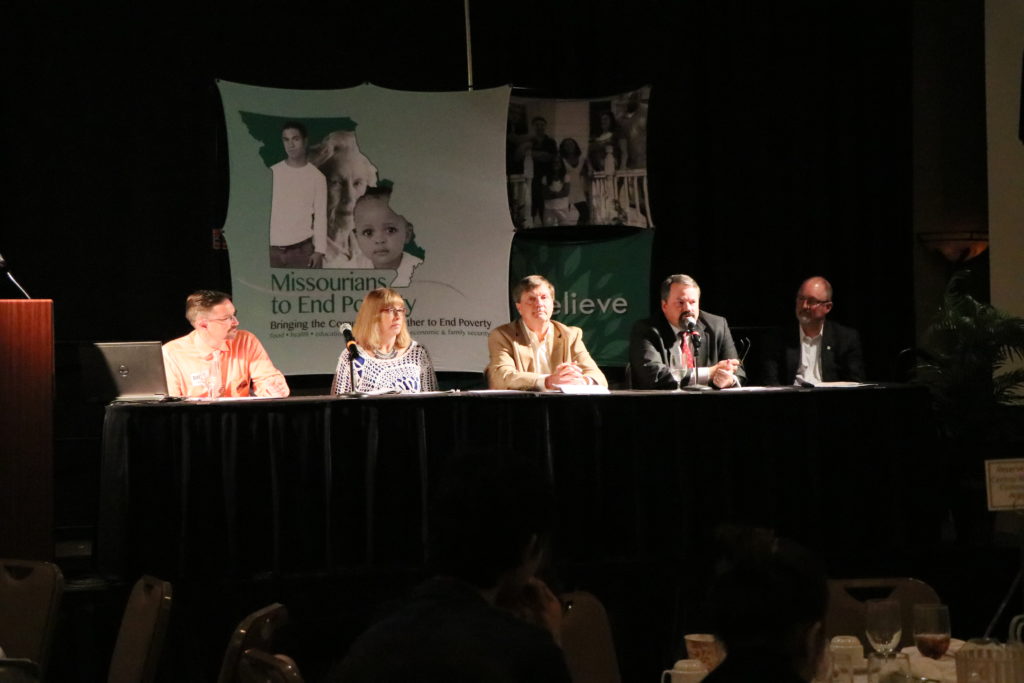 The Community-Based Solutions Panel discusses how they address poverty on a city-level. From left to right, Susan Sundermeyer and Steven Duncan, Chamois residents, Mike Matthes, City Manager of Columbia, Greg Burris, City Manager of Springfield. 